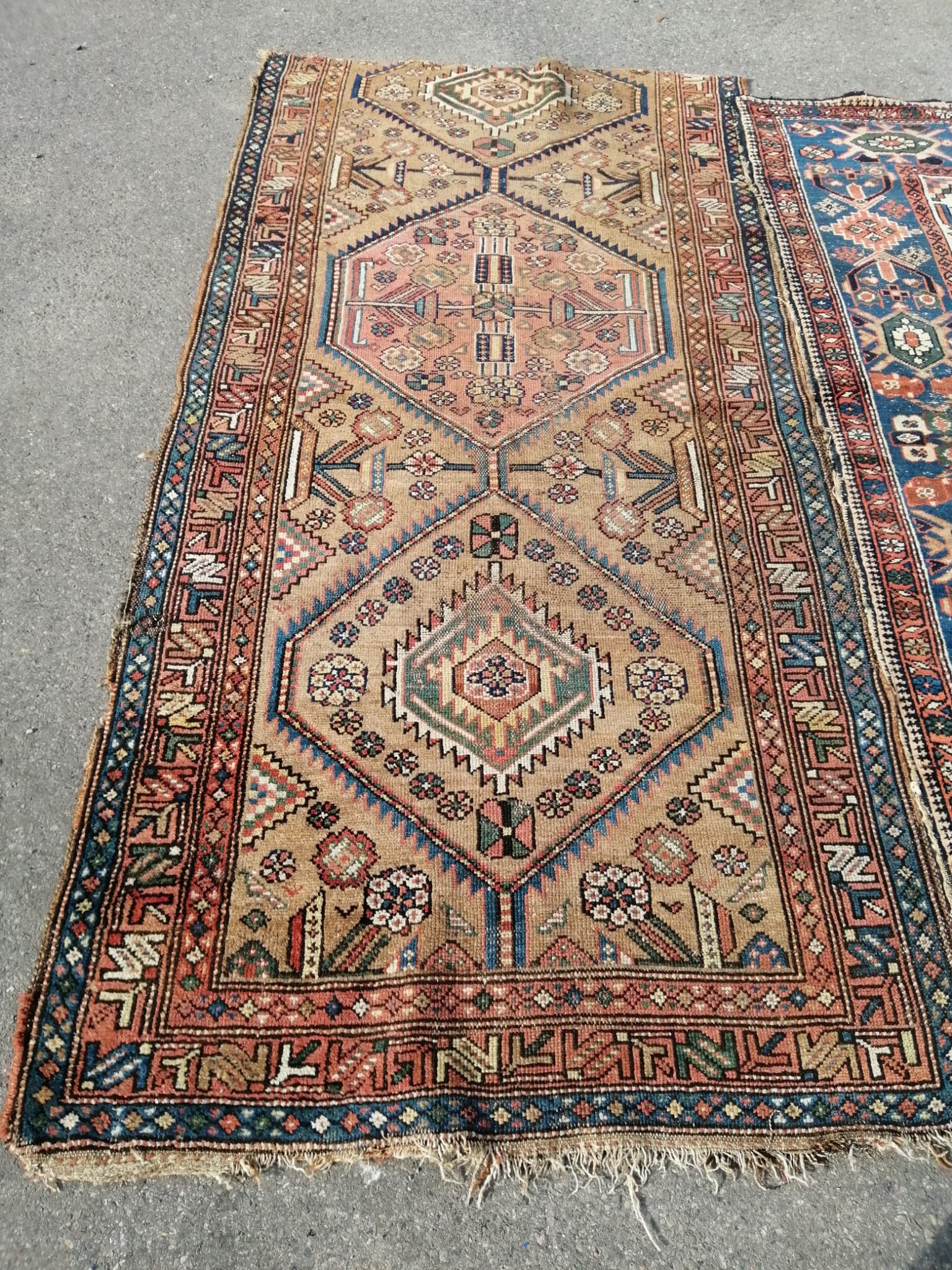 Two Caucasian rugs, red ground with central medallion, 198 x 134cm, the other 227 x 112cm